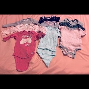 Bundle of 9 onesies:  all 6-9 months